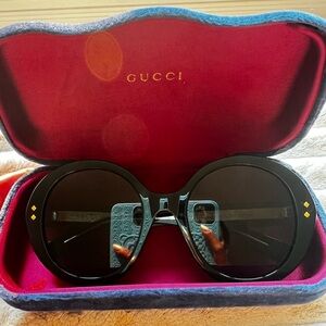 Gucci Sunglasses. Never worn like new. Authentic.